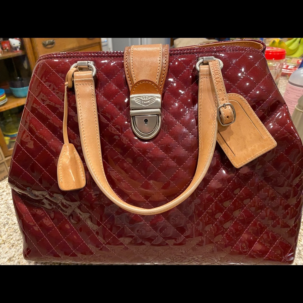 Beautiful Consuela Satchel bag, in burgundy.